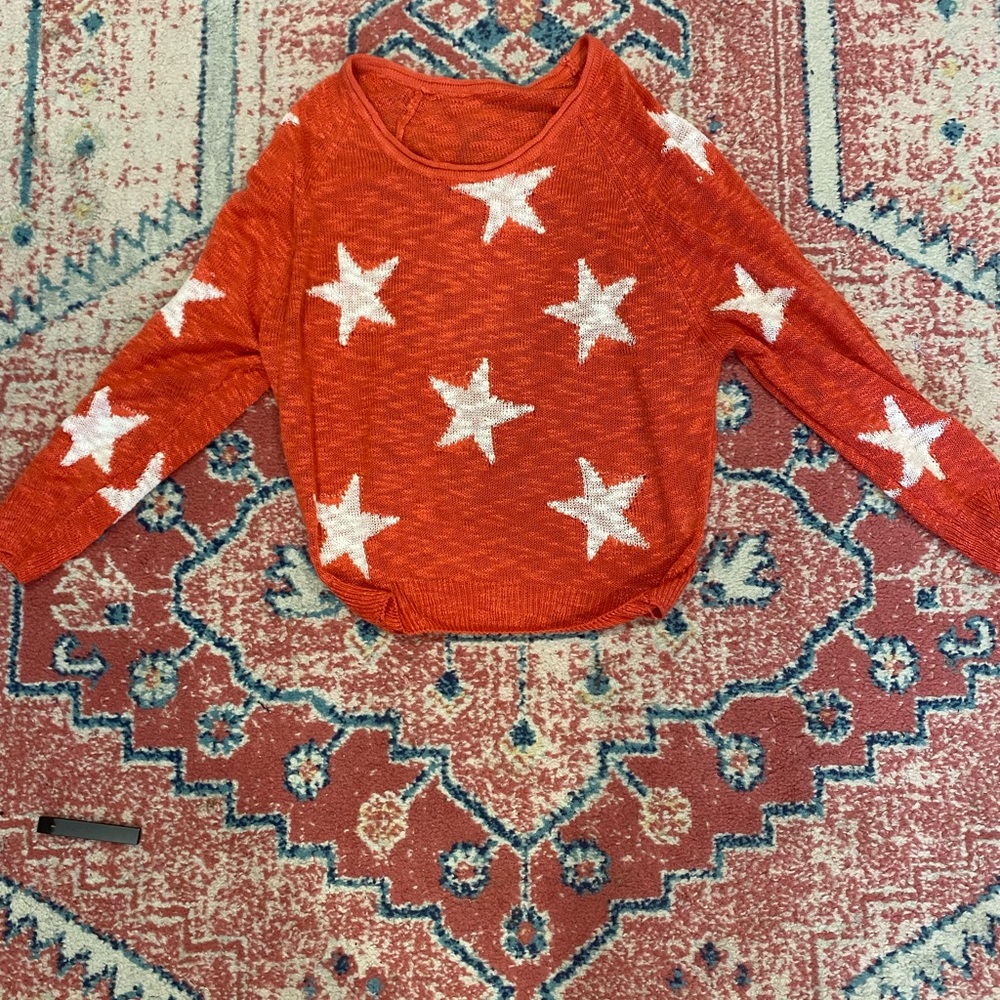 Red sweater with white stars from ASOS. Size small/medium